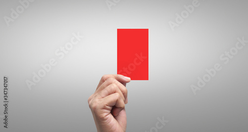 Referee hand holding  red cards. isolated photo