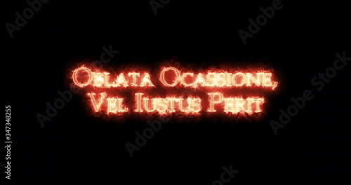 Oblata ocassione vel iustus perit written with fire. Loop photo