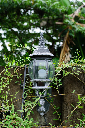 old fashioned lantern in the garden