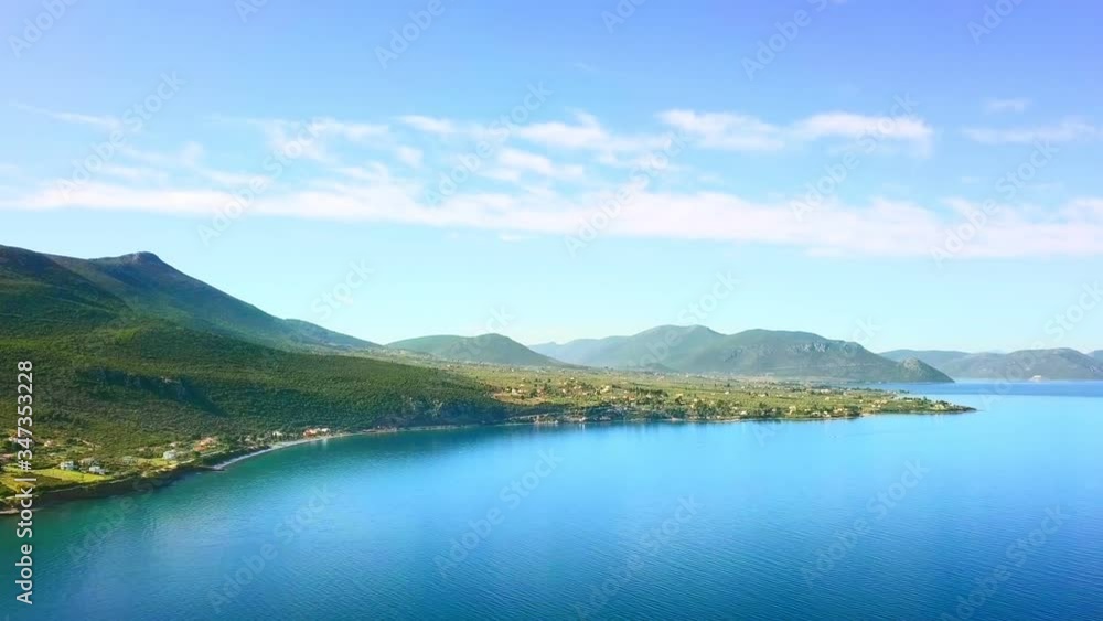 Aerial view of mountains by sea in Greece, green mountain and Gulf of Aegean sea Aerial view of mountains by sea in Greece, green mountain and Gulf of Aegean sea