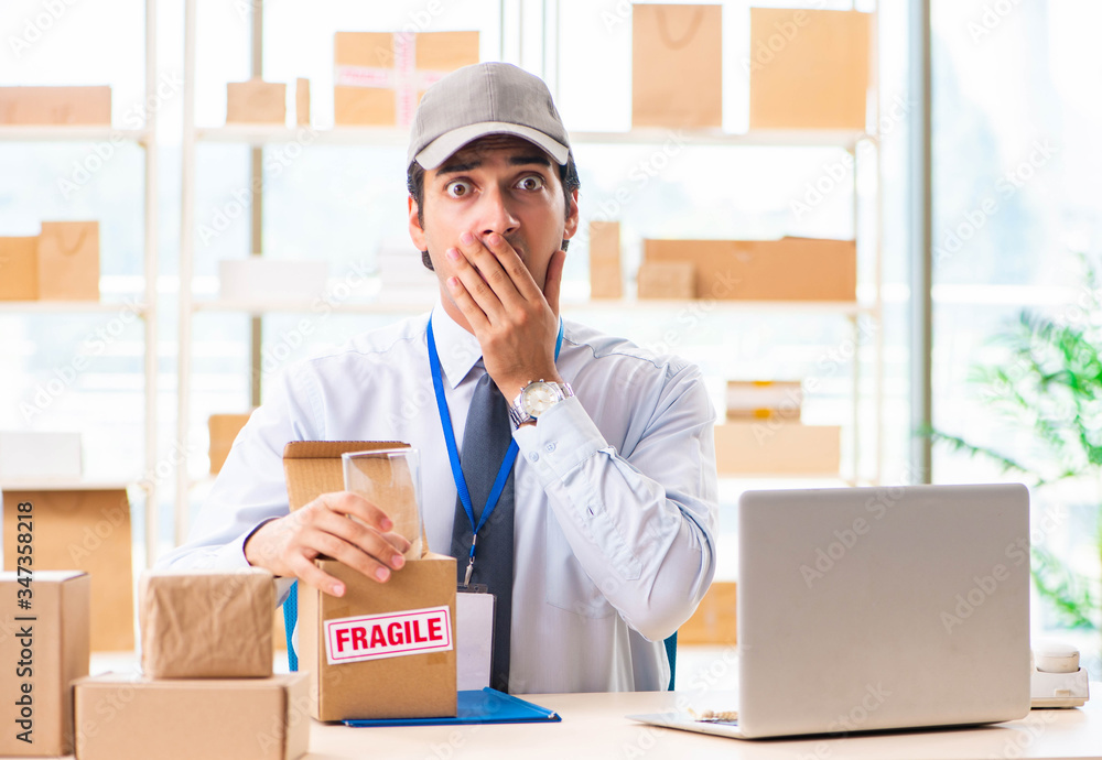 Male employee working in box delivery relocation service Male employee working in box delivery relocation service
