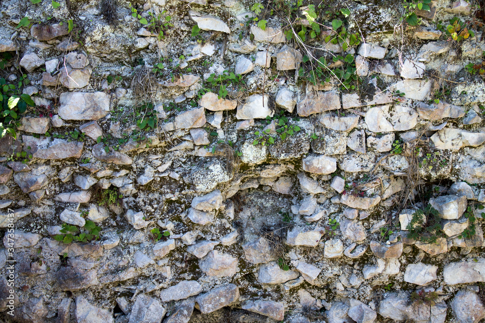 Fototapeta premium Stone wall decorative coating natural stone