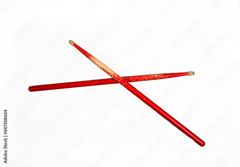 red drumsticks isolated on white background flat lay red drumsticks isolated on white background flat lay