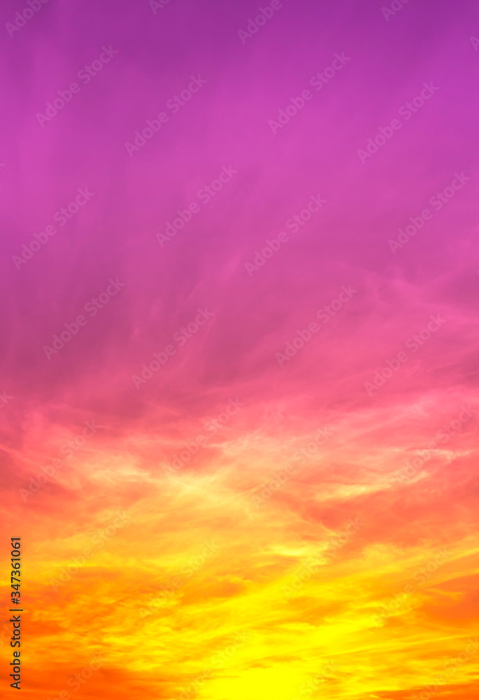 Obraz premium orange and red color light in blurry clouds with purple pink sky,abstract sky background