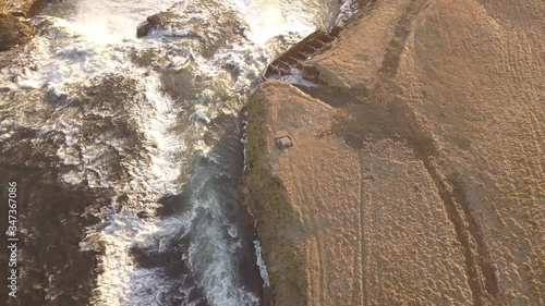 4K aerial footage of amazing waterfall known as Aegissufoss (Ægissíðufoss) Waterfall located in Hella, Iceland.