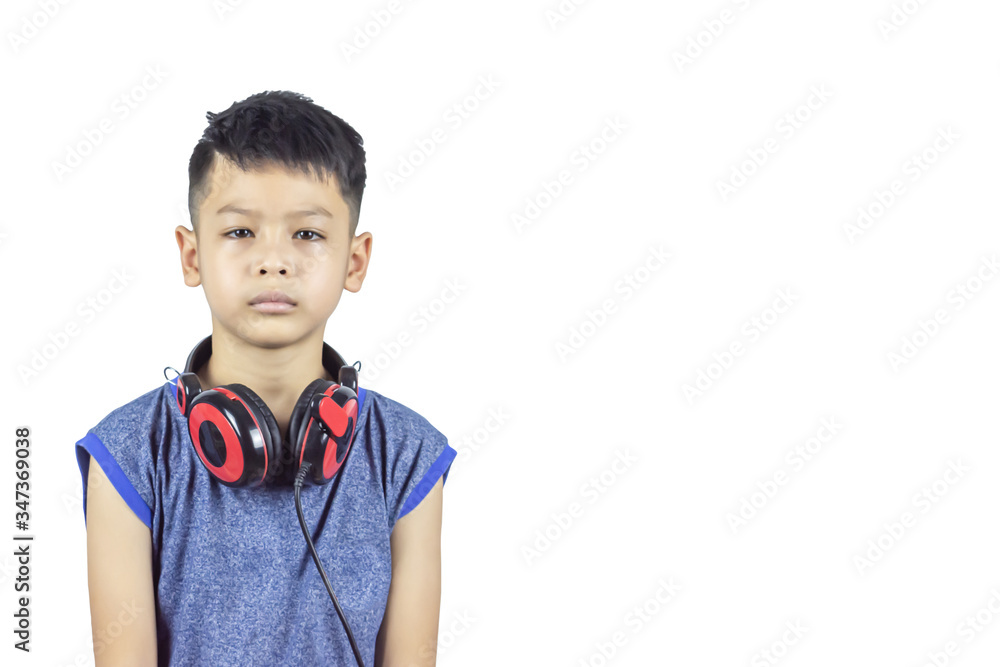 Isolated Portrait of Asian boy wearing headphones on a white background with clipping path. Isolated Portrait of Asian boy wearing headphones on a white background with clipping path.