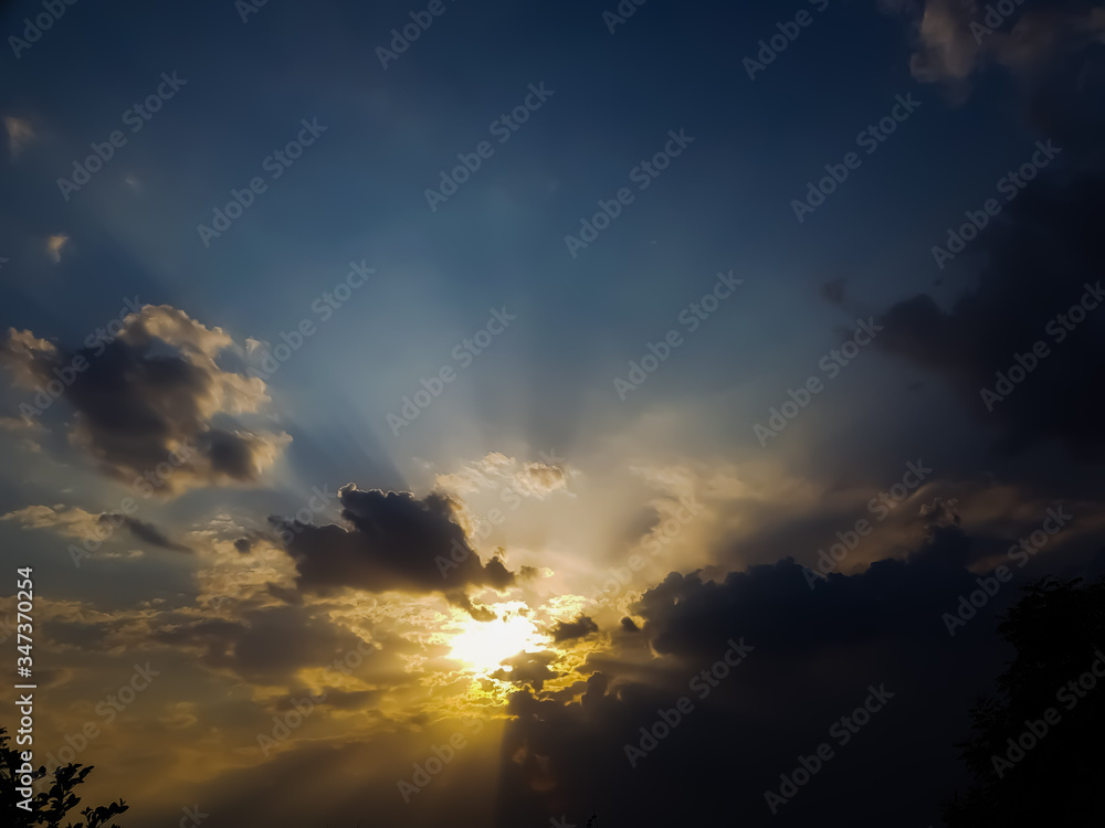 beautiful dramatic black clouds at sunset time