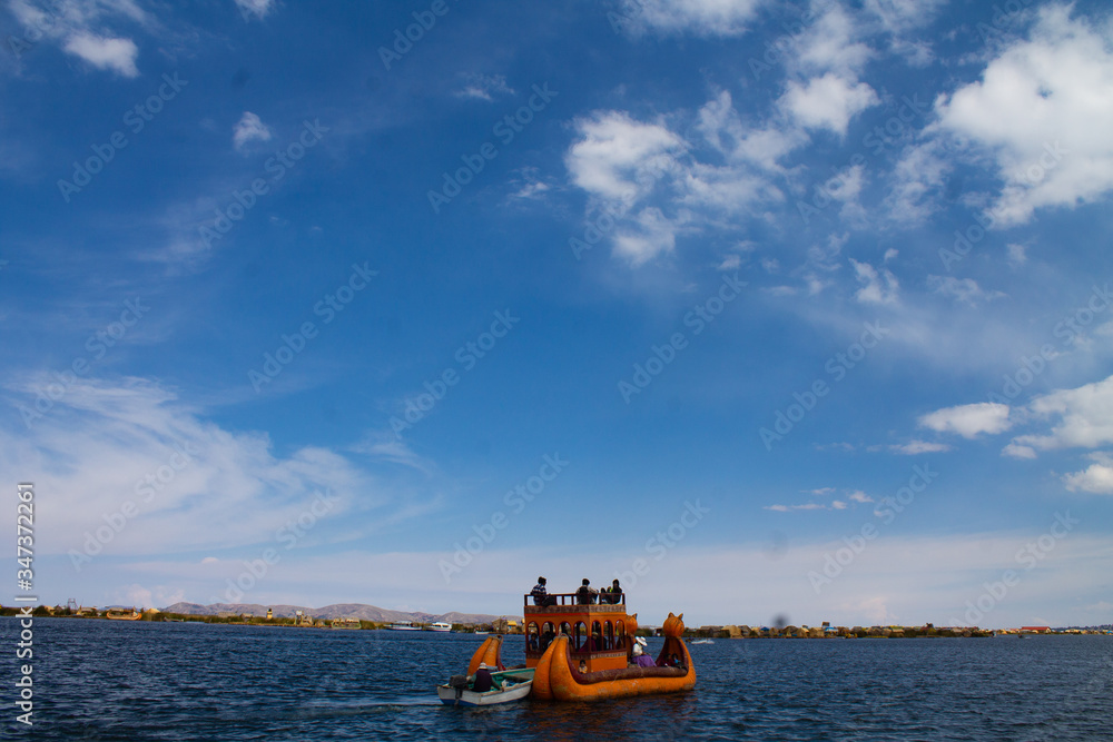 “Caballito de tototra” sailing on the island of the urus of lagoo Titicaca, Puno.