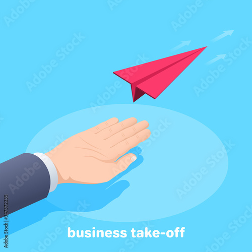 Fotografía isometric vector image on a blue background, male hand and flying paper airplane