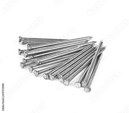 Steel nails on white background