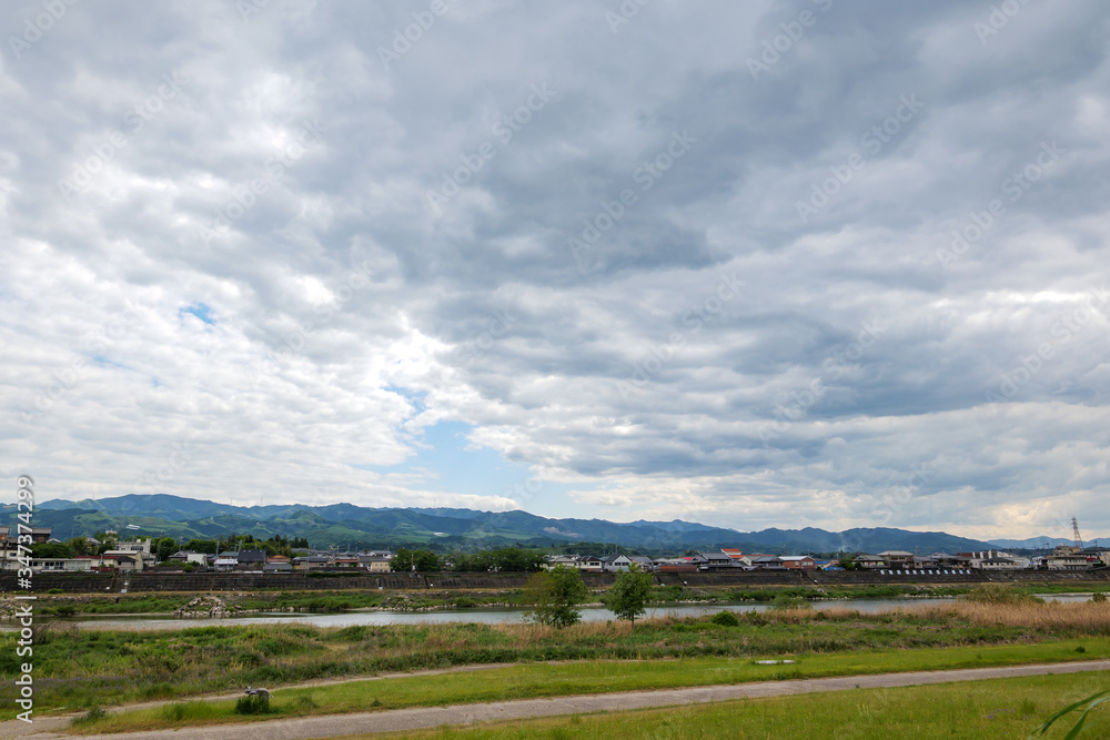 Cloudy sky at the riverbank in Gojo, Nara