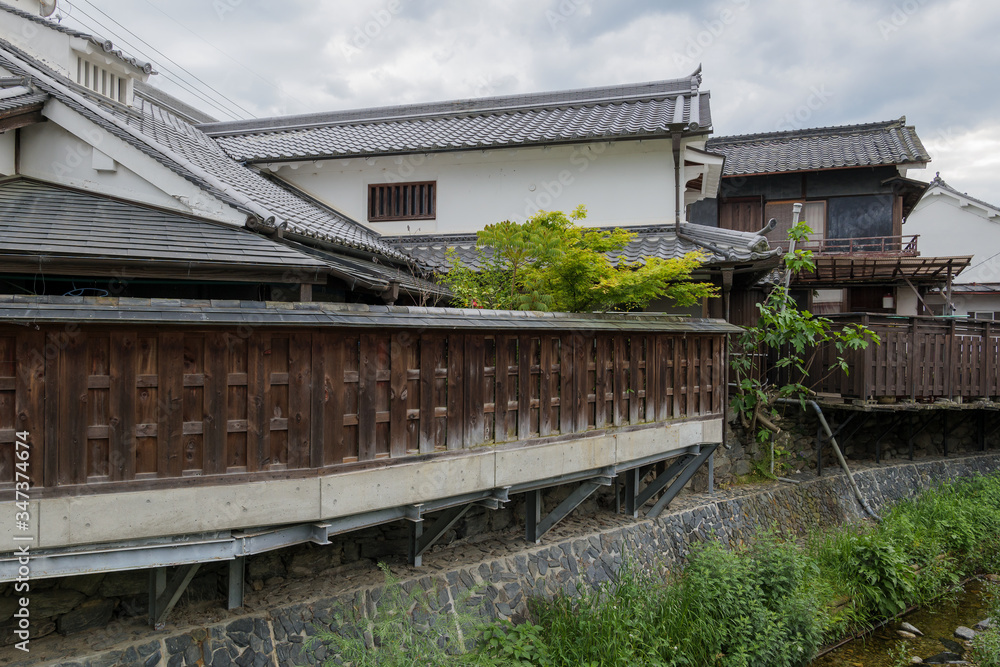 A traditional Japanese mansion and its stone walls