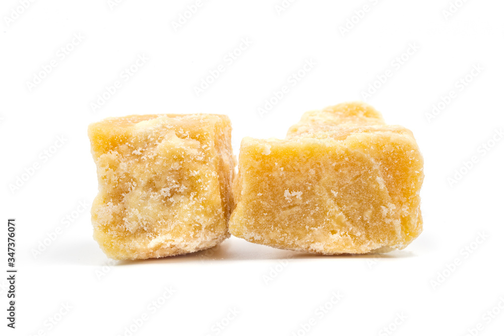 Coconut sugar cubes on white background. Coconut sugar cubes on white background.