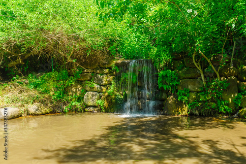 Fototapeta Naklejka Na Ścianę i Meble -  Travertine falls in the Snir Stream (Hasbani River) Nature Reserve