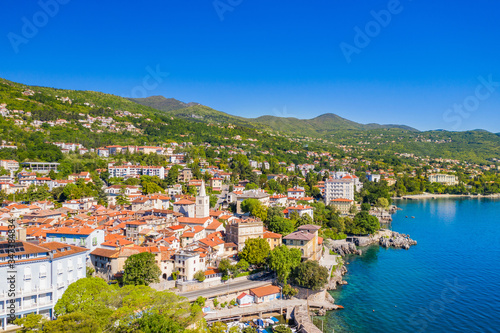 Croatia  beautiful town of Lovran and sea walkway  aerial panoramic view in Kvarner bay coastline  popular tourist destination