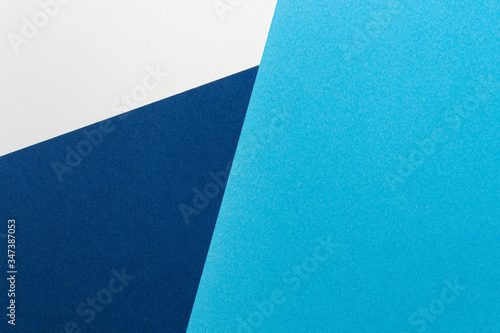 Abstract modern paper background with blue, light blue and white colors. Minimal design. Colorful paper blocks mock up. Trendy block background. Abstract geometry
