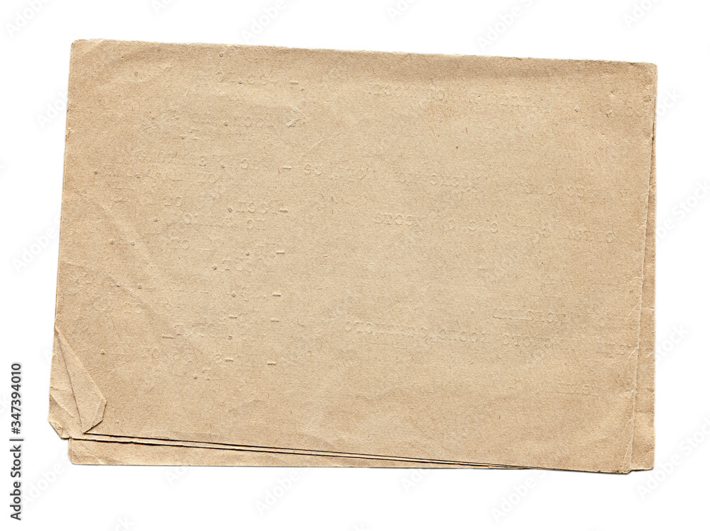 Vintage beige paper blank with torn edges isolated on white background. Old paper texture for design.