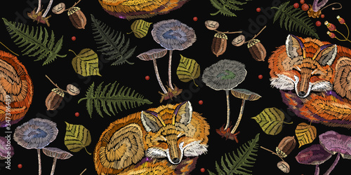Embroidery. Red fox sleeping in autumn forest. Mushrooms and herbs seamless pattern. Fashionable template for design of clothes