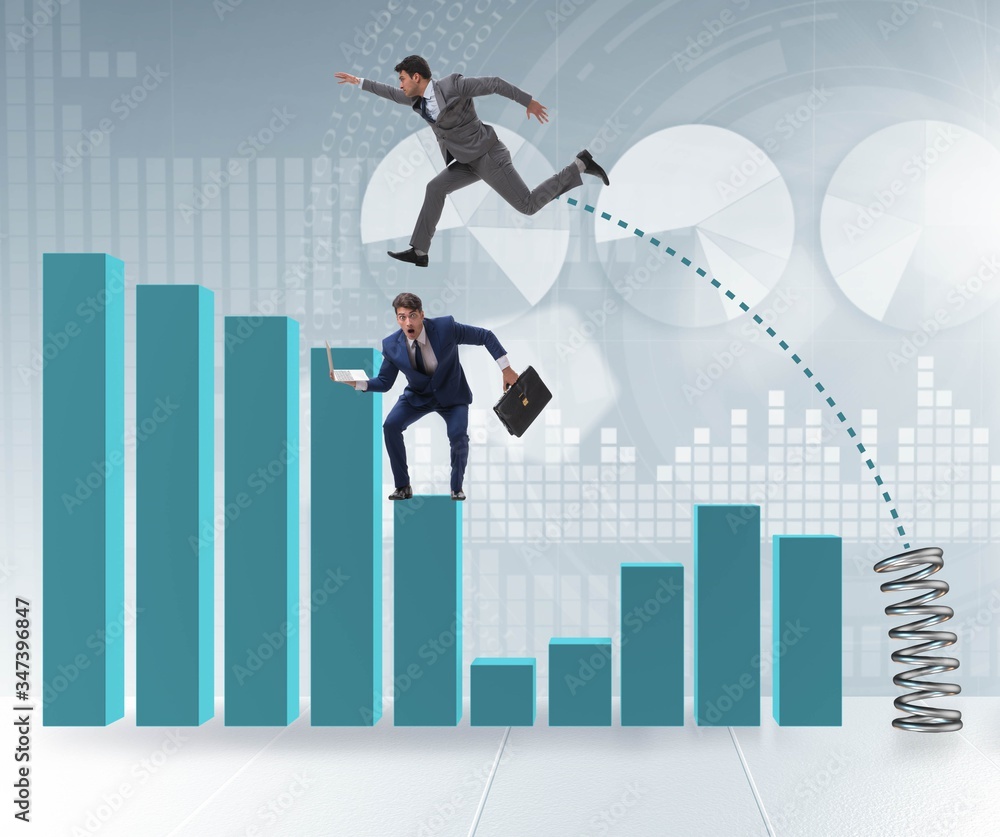 Businessman outperforming his competition jumping over Businessman outperforming his competition jumping over