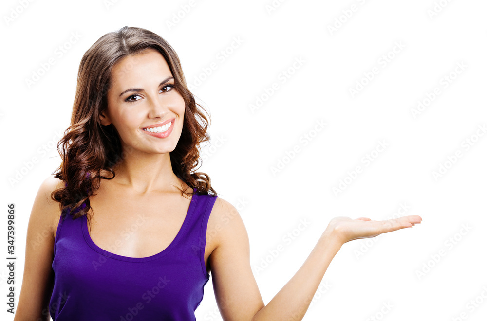 Happy smiling woman giving, holding or showing something or copy space for some text, product or imaginary, isolated over white background. Beautiful brunette girl in ad concept studio picture. Happy smiling woman giving, holding or showing something or copy space for some text, product or imaginary, isolated over white background. Beautiful brunette girl in ad concept studio picture.