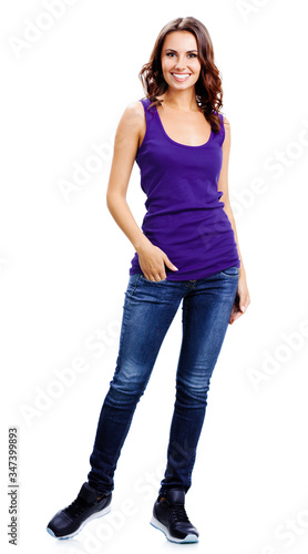 Full body portrait of young cheerful smiling brunette woman, isolated over white background