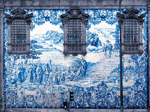 Ceramic tiles artwork at the outer wall of the Carmo Church in Porto, Portugal