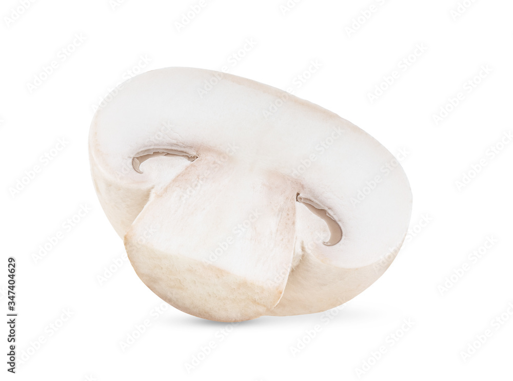 Fototapeta premium Fresh champignon mushrooms on white background