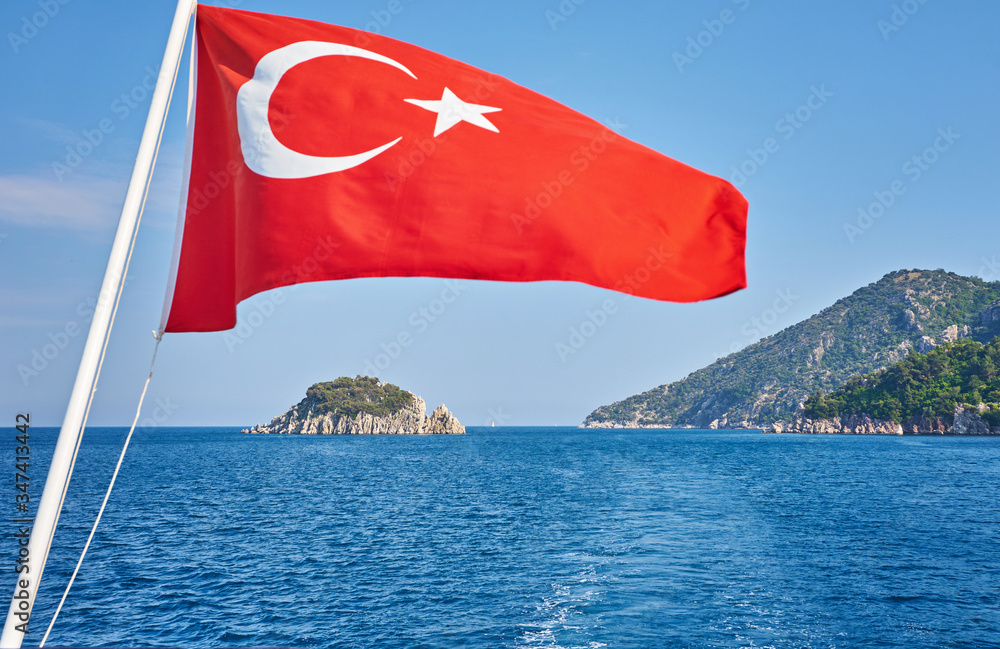 National flag of Turkey with Akdamar Island in background