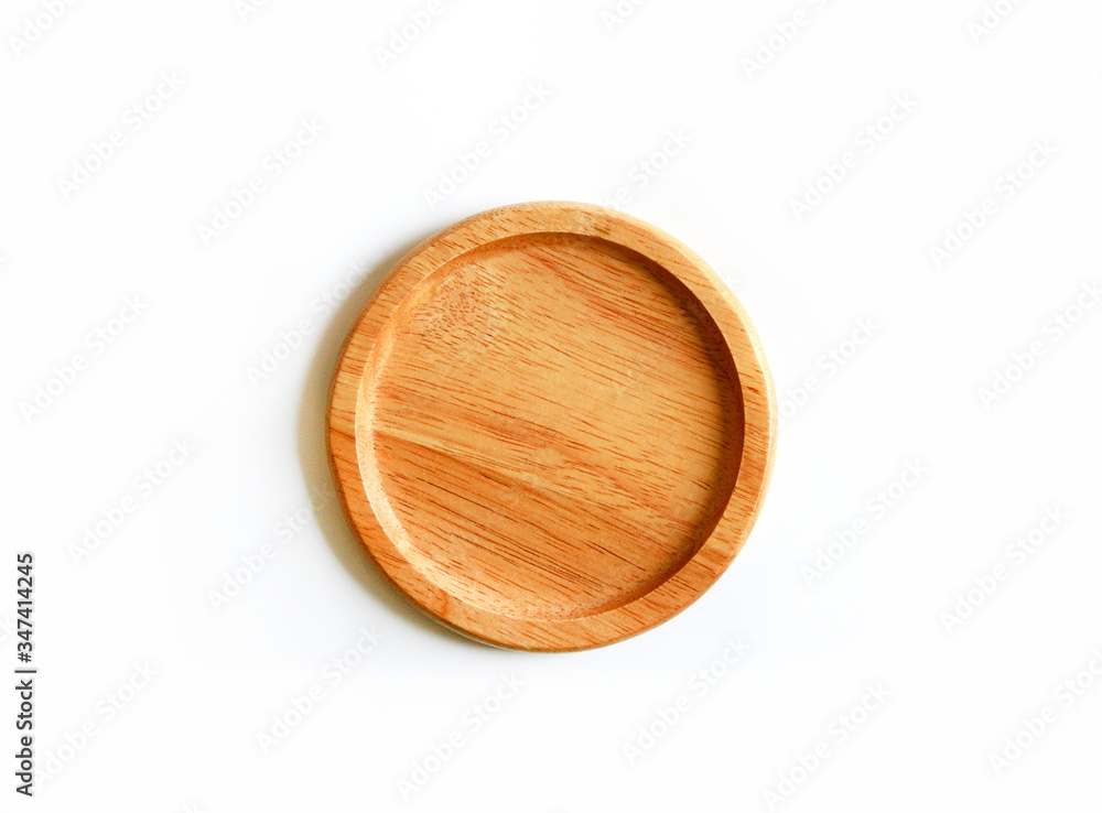 Brown wooden coasters isolated on white background. This object use for carry glass, bottle or drinking water. Brown wooden coasters isolated on white background. This object use for carry glass, bottle or drinking water.