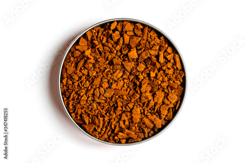 chaga mushroom. small dry pieces of birch tree fungus chaga in a round bowl isolated with shadow on a white background. concept of alternative natural medicine photo