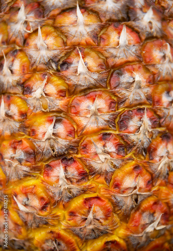 Ripe pineapple skin texture, tropical fruit background
