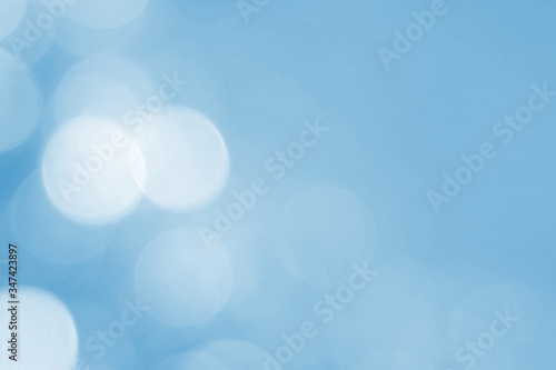 Abstract blue bokeh background. Defocused pattern for advertising, newspaper, magazine design. Universal. Storm, holiday, pattern, blur, sky, effect. copy space