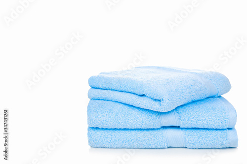 Blue towel isolated on white background with copy space