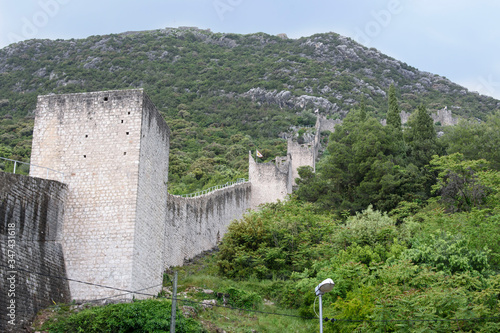 View of part of the route of the wall, in Ston, Dubrovnik Neretva county, located on the Peljesac peninsula, Croatia, Europe. photo