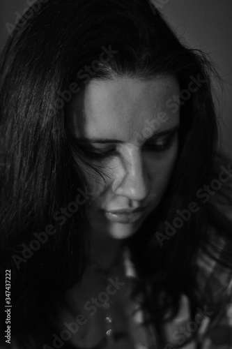portrait of a young girl in black and white color, emotions