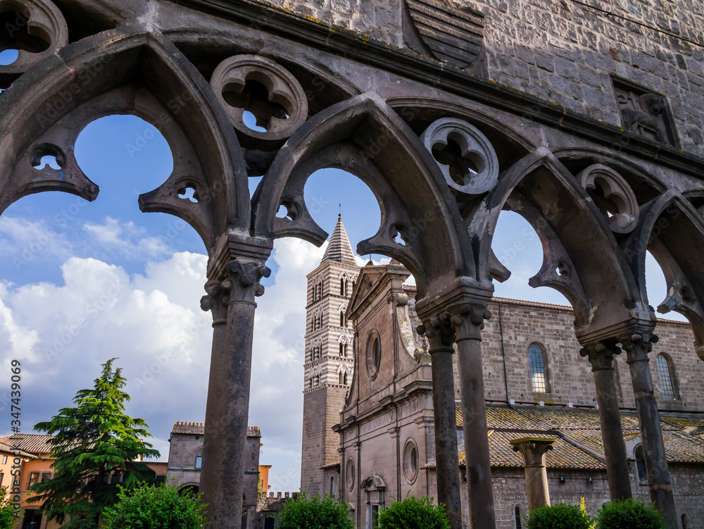 Fototapeta premium Viterbo, impressive view of Saint Lawrence romanesque cathedral from the Loggia of the Papal Palace, Lazio, central Italy