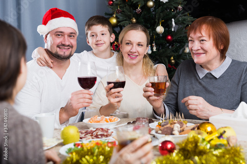 Family at dining table for Christmas dinner