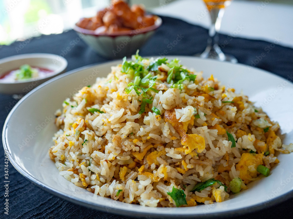 Egg Fried Rice Golden yellow
Soft, fragrant rice, sprinkled with spring onion, coriander on a white bowl,With Chicken Sausage
fried,With tomato sauce, cut in sour taste,Orange juice on glass Egg Fried Rice Golden yellow
Soft, fragrant rice, sprinkled with spring onion, coriander on a white bowl,With Chicken Sausage
fried,With tomato sauce, cut in sour taste,Orange juice on glass