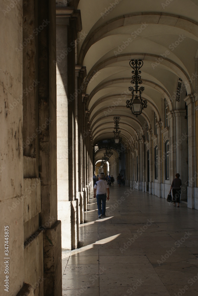 classical archways with ornate lights classical archways with ornate lights