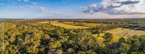 Scenic aerial panorama of agricultural land and native trees on Mornington Peninsula, Victoria, Australia photo