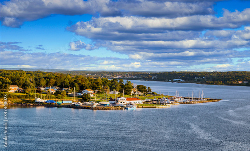 Tela Homes and boats along the shore of Sydney, Nova Scotia, Canada