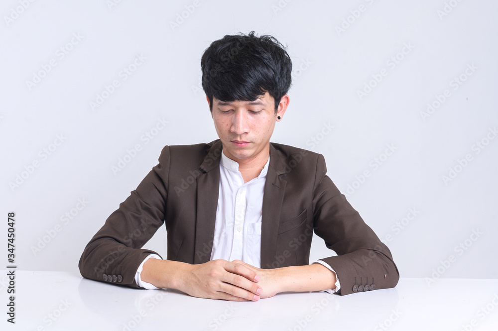 Young Men Unemployed During the Covid Period 19. 
The young man took a leave of office.
Disappointed young man unemployed.
