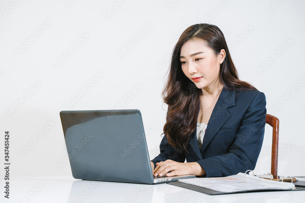 young asian woman finding job at office home.Beautiful young woman using a laptop computer. Portrait of asian young asian woman finding job at office home.Beautiful young woman using a laptop computer. Portrait of asian