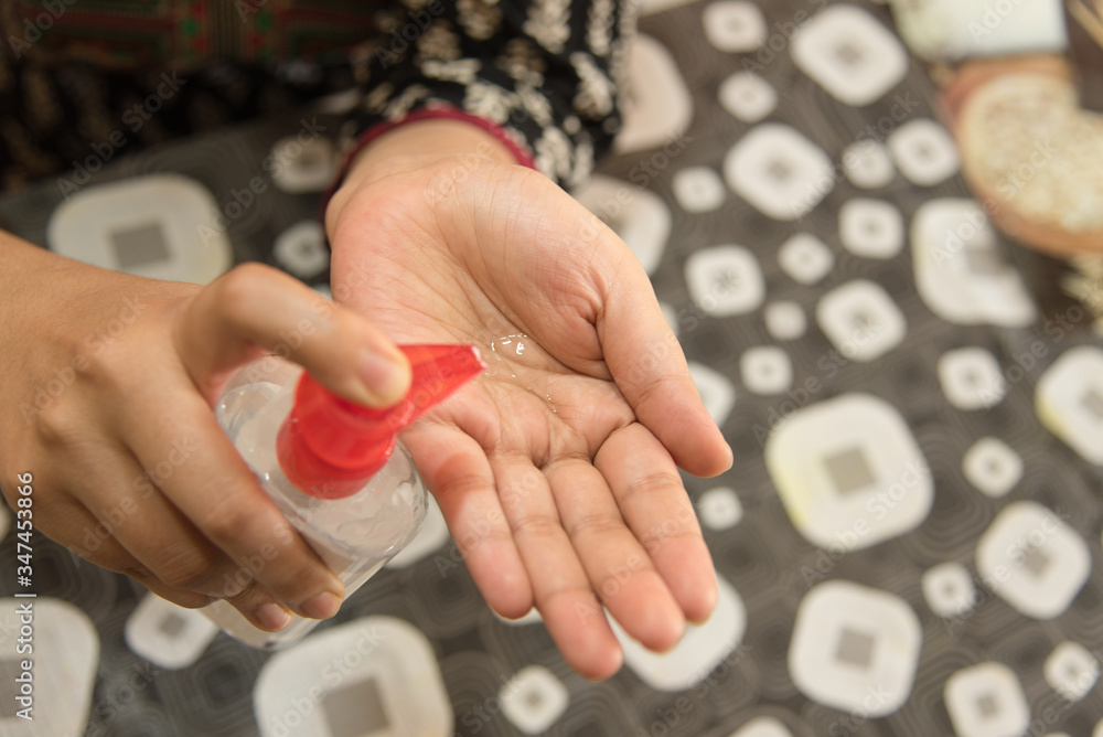 Person taking sanitizer on hand during corona virus and flu outbreak. Protection from virus. Corona virus protection concept. Person taking sanitizer on hand during corona virus and flu outbreak. Protection from virus. Corona virus protection concept.