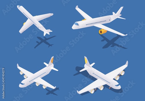 Isometric passenger airplanes during take-off, in flight and on ground. Vector concept collection isolated on blue background with shadows
