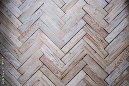Light beige parquet floor with contrast structure of wood
