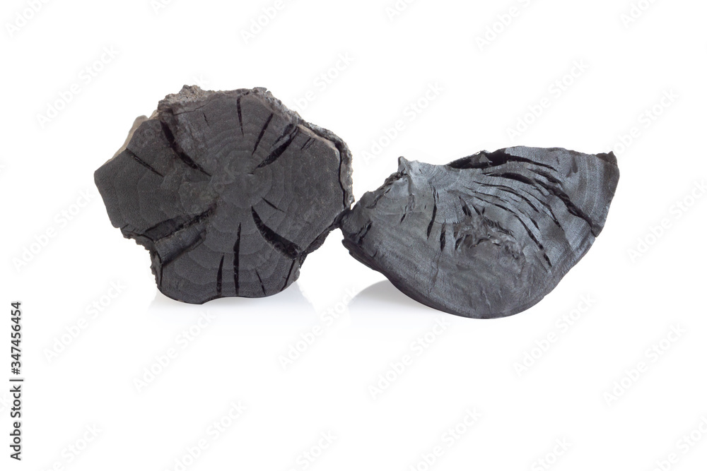 Natural black charcoal isolated on white background Natural black charcoal isolated on white background