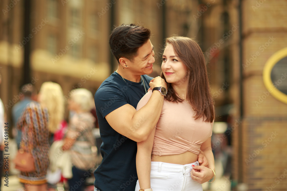 Fototapeta premium happy young couple hugging