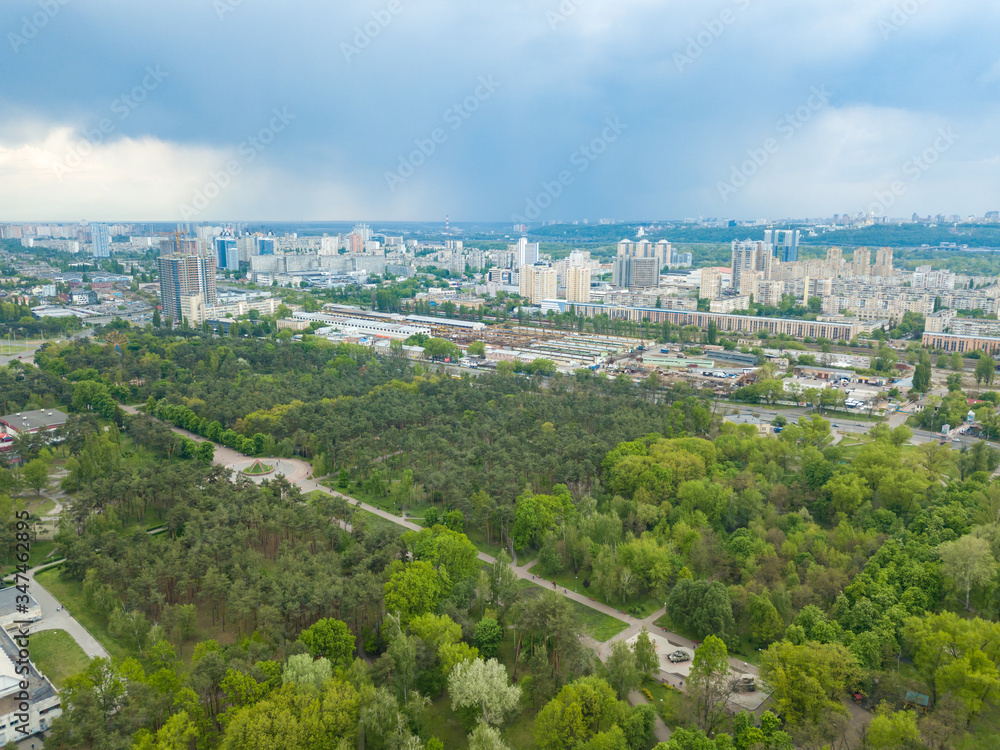 Spring rain over the park in Kiev. Aerial drone view.