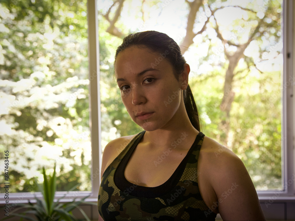 Strong latina woman ready for working out at home Strong latina woman ready for working out at home